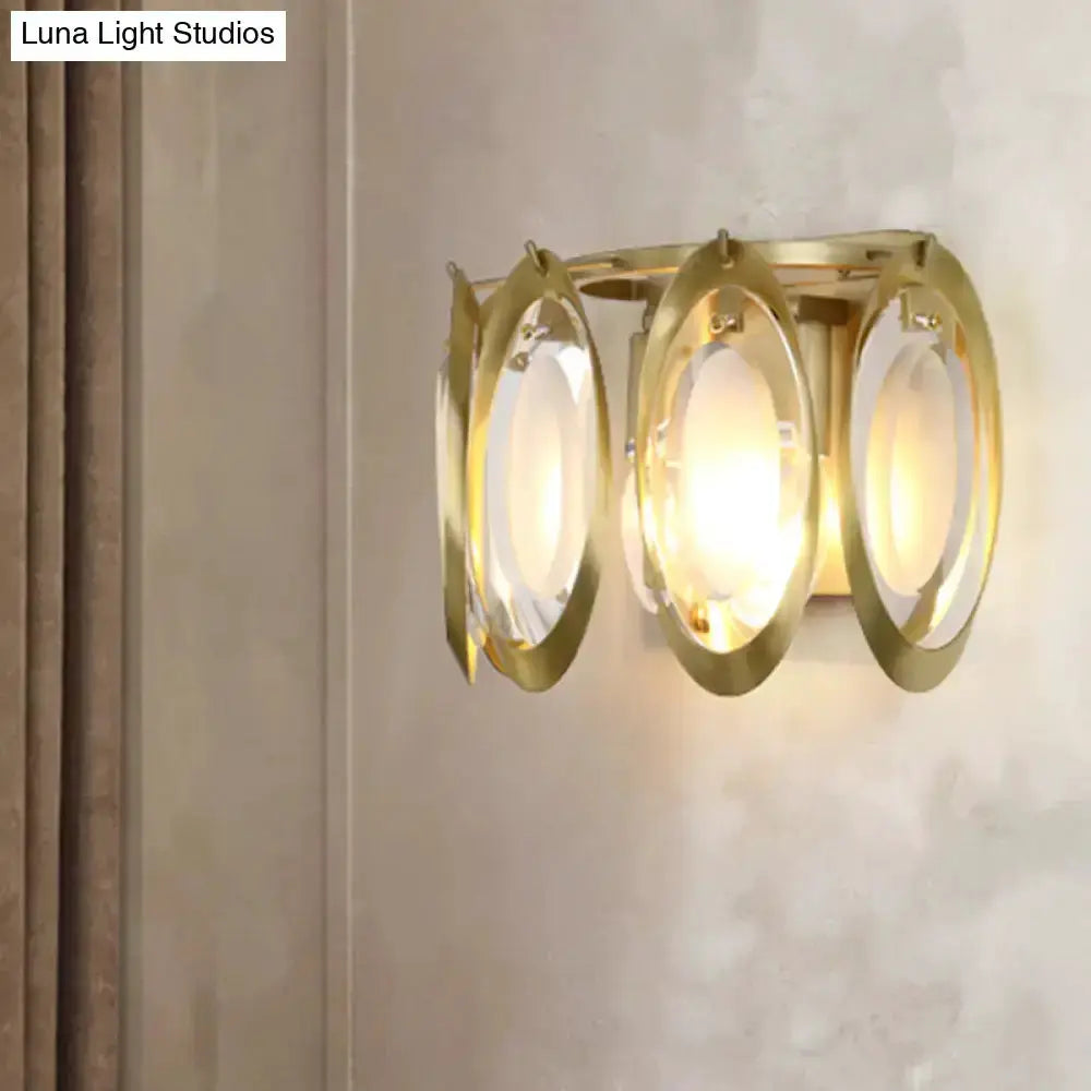 Modern gold oval sconce light living room wall fixture with glass panels and three rings on Tampa Home & Garden Store