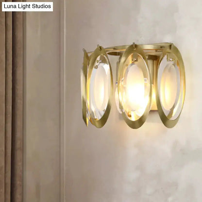 Modern gold oval sconce light living room wall fixture with glass panels and three rings on Tampa Home & Garden Store