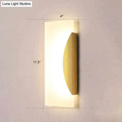 Gold acrylic wall sconce with frosted white panel and curved brass-tone accent Decorbites on Tampa Home & Garden Store