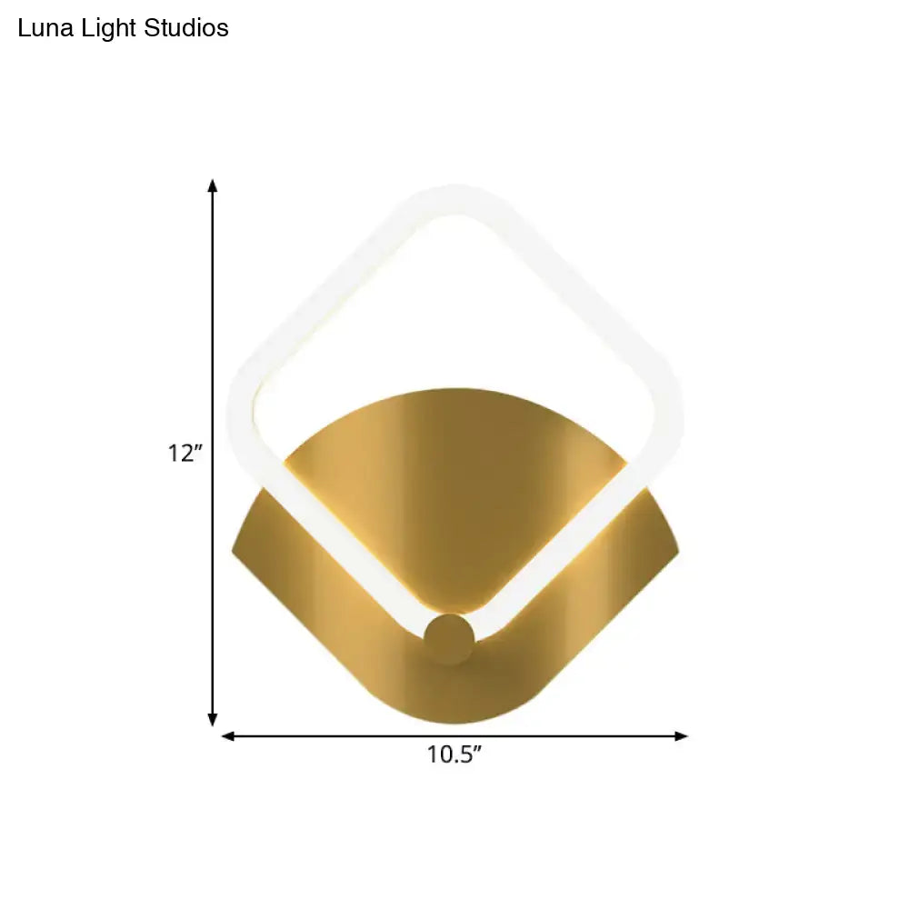 Gold LED warm-glow wall sconce with white square halo frame on a gold metal base, diamond-style on Tampa Home & Garden Store