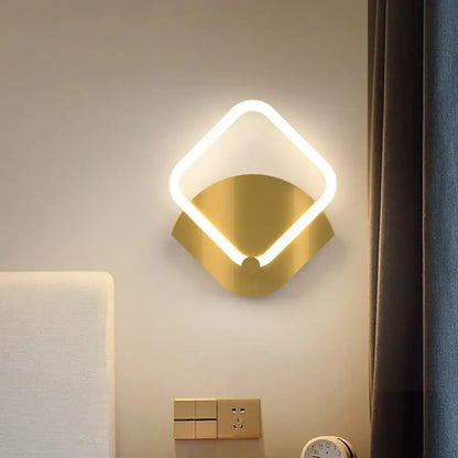 Gold LED warm-glow wall sconce with diamond-shaped light ring and brass finish by Decorbites on Tampa Home & Garden Store