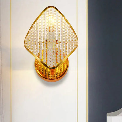 Gold clear crystal wall light by Decorbites with crystal beads and gold mount on Tampa Home & Garden Store