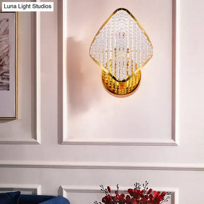 Gold clear crystal wall light with diamond-shaped crystal shade and gold mount on Tampa Home & Garden Store