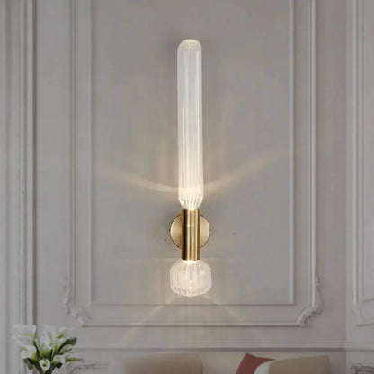 Decorbites modern gold ribbed glass wall sconce with brass mount for bedroom on Tampa Home & Garden Store