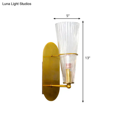 Gold ribbed glass industrial wall sconce by Decorbites with brass finish and two shades on Tampa Home & Garden Store