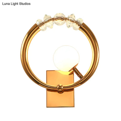 Gold crystal wall sconce with circular gold ring, LED globe and metal base Decorbites on Tampa Home & Garden Store