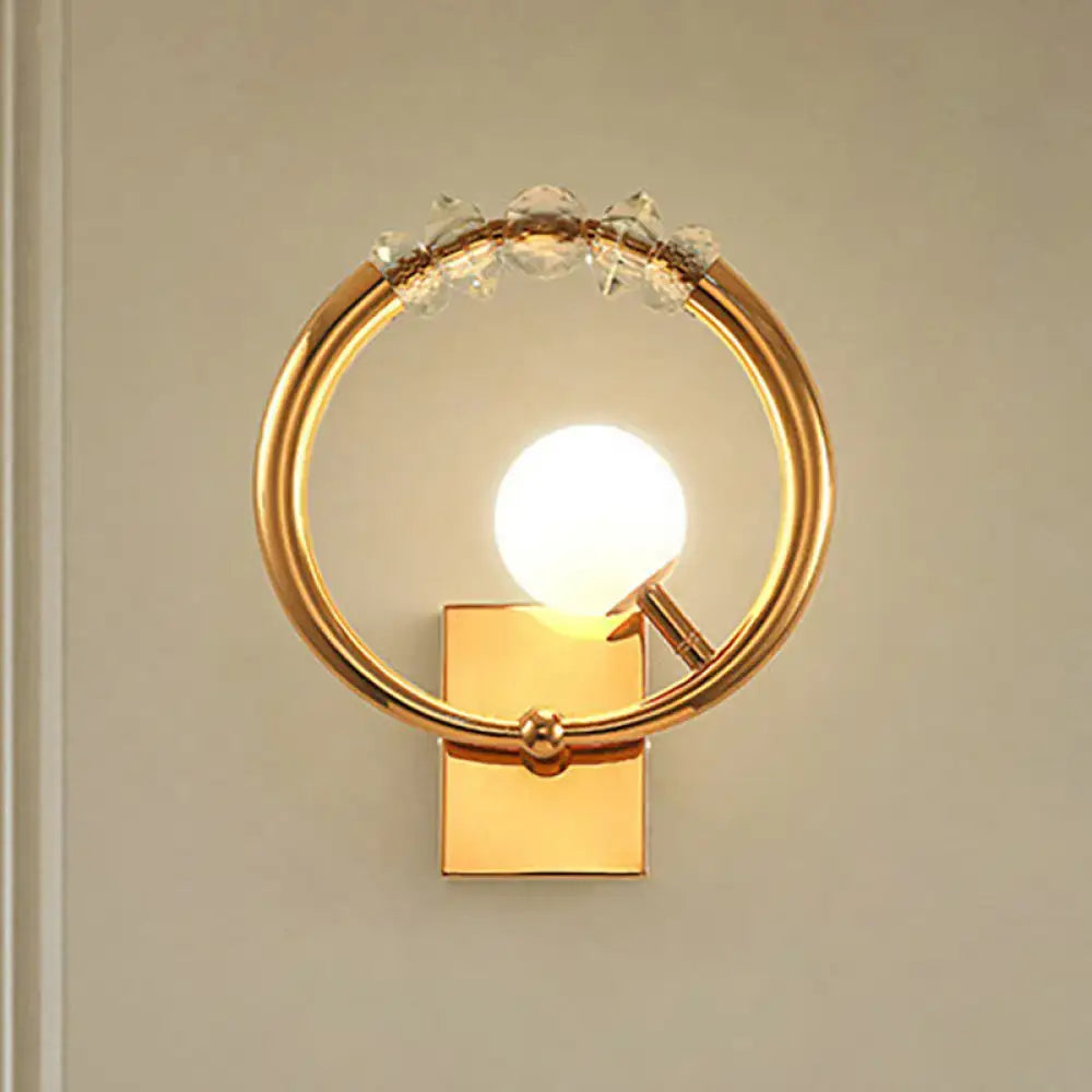 Decorbites gold crystal ring wall sconce with metal base and LED bulb on Tampa Home & Garden Store