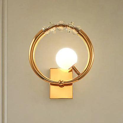 Decorbites gold crystal ring wall sconce with metal base and LED bulb on Tampa Home & Garden Store