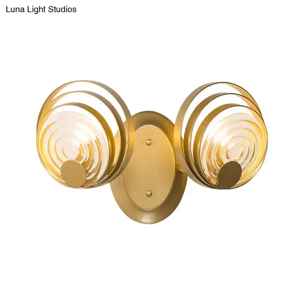 Modern gold ripple glass dual-ring wall sconce with spiral rings by Decorbites for living room on Tampa Home & Garden Store