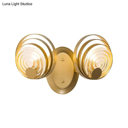 Modern gold ripple glass dual-ring wall sconce with spiral rings by Decorbites for living room on Tampa Home & Garden Store