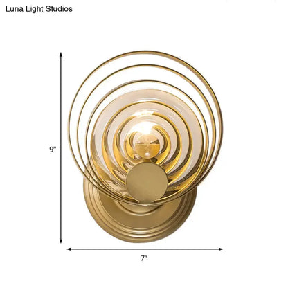 Modern gold ripple glass wall light fixture with concentric rings and bulb, Decorbites on Tampa Home & Garden Store