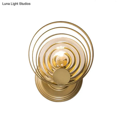 Modern gold ripple glass wall light with concentric rings by Decorbites on Tampa Home & Garden Store