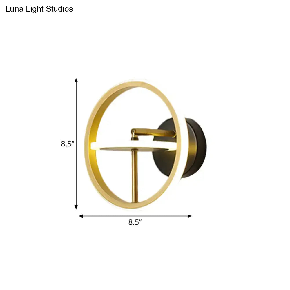 Gold rotatable wall sconce by Decorbites with black backplate, 8.5-inch diameter on Tampa Home & Garden Store