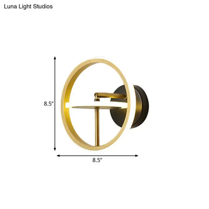 Gold rotatable wall sconce by Decorbites with black backplate, 8.5-inch diameter on Tampa Home & Garden Store