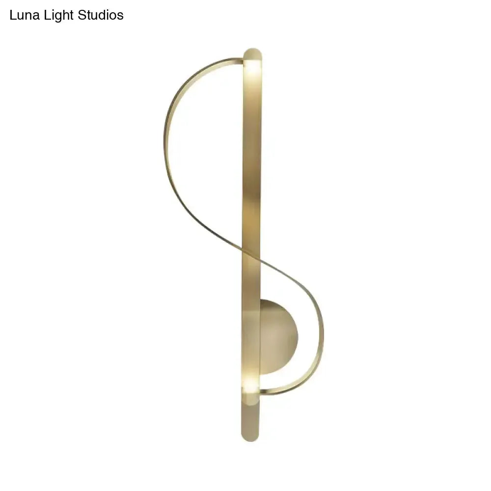 Modern gold s-shape wall lighting fixture for living room corner on Tampa Home & Garden Store