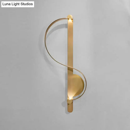 Modern gold S-shaped wall light with ring accents by Decorbites for living room on Tampa Home & Garden Store