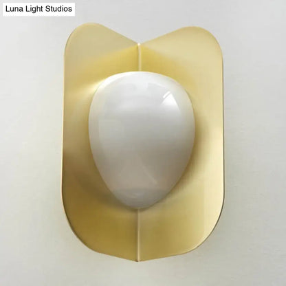 Gold curved metal sconce with white glass orb; wall-mount Decorbites on Tampa Home & Garden Store