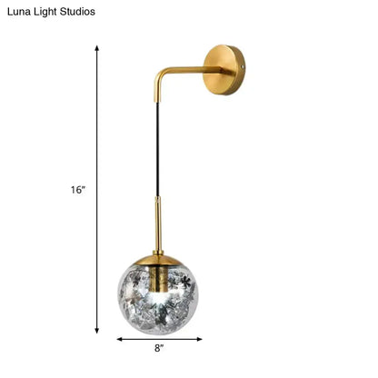 Modern gold shattered leaf clear glass globe wall sconce with curved arm Decorbites for bedroom on Tampa Home & Garden Store