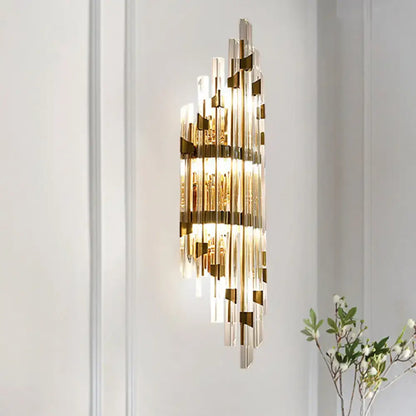 Gold Crystal Three-Light Rod Sconce Decorbites brass finish with glass prisms on Tampa Home & Garden Store
