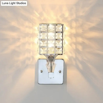 Gold Silver Crystal Sconce with grid crystal shade and chrome backplate casting warm light on wall on Tampa Home & Garden Store