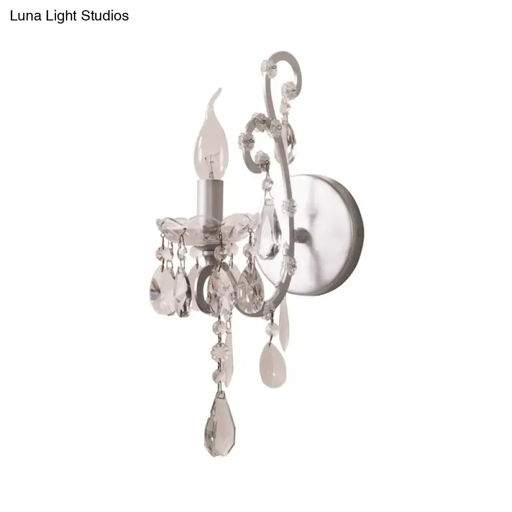 Crystal Drop Wall Sconce by Decorbites in silver with hanging crystal prisms on Tampa Home & Garden Store