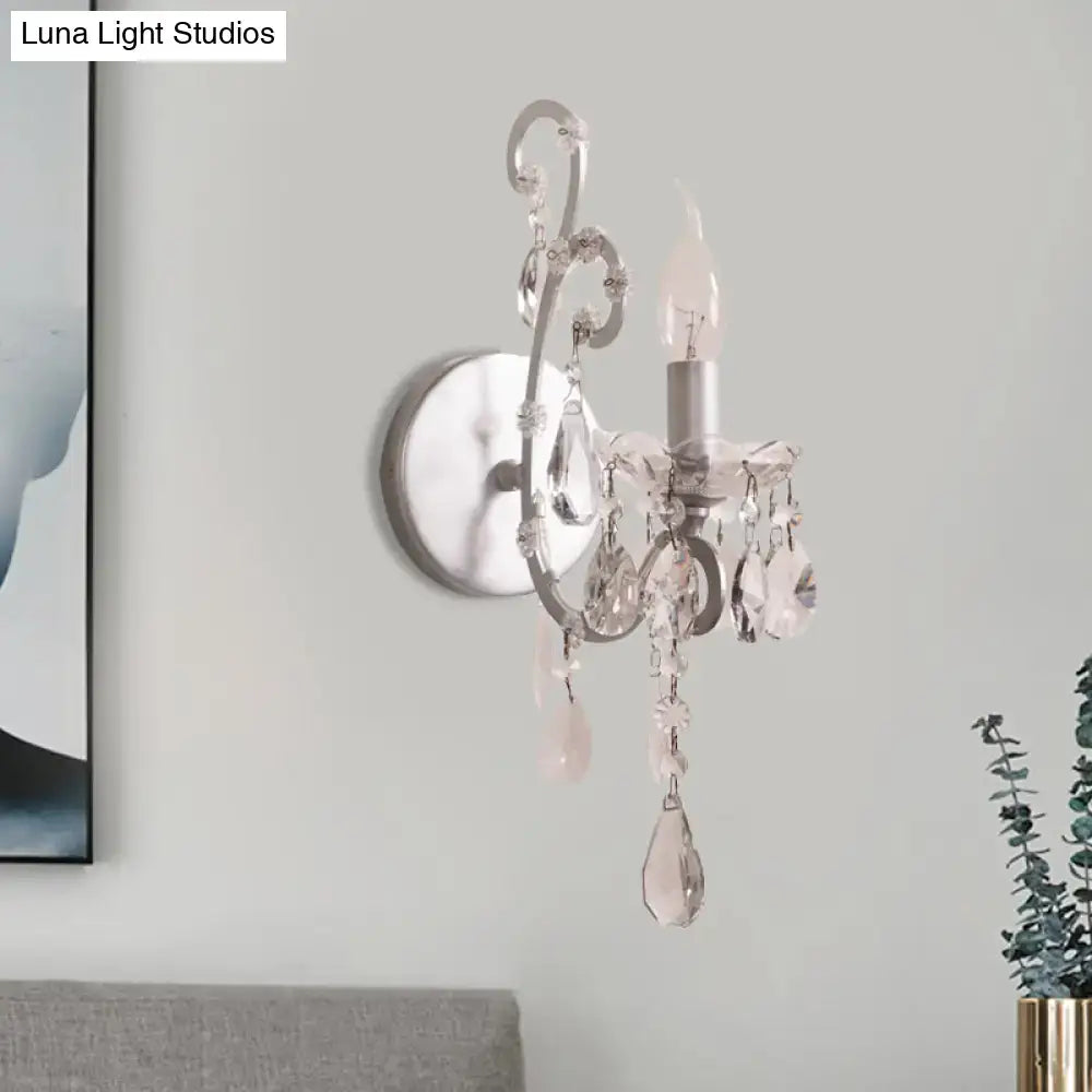 Crystal Drop Wall Sconce by Decorbites with silver finish and hanging crystal droplets on Tampa Home & Garden Store
