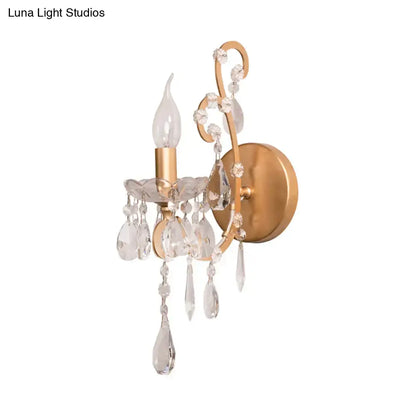 Crystal Drop Wall Sconce by Decorbites, gold/brass finish with hanging crystal prisms on Tampa Home & Garden Store