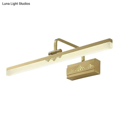 Brass swing-arm sconce with LED light bar and mountain motif on Tampa Home & Garden Store