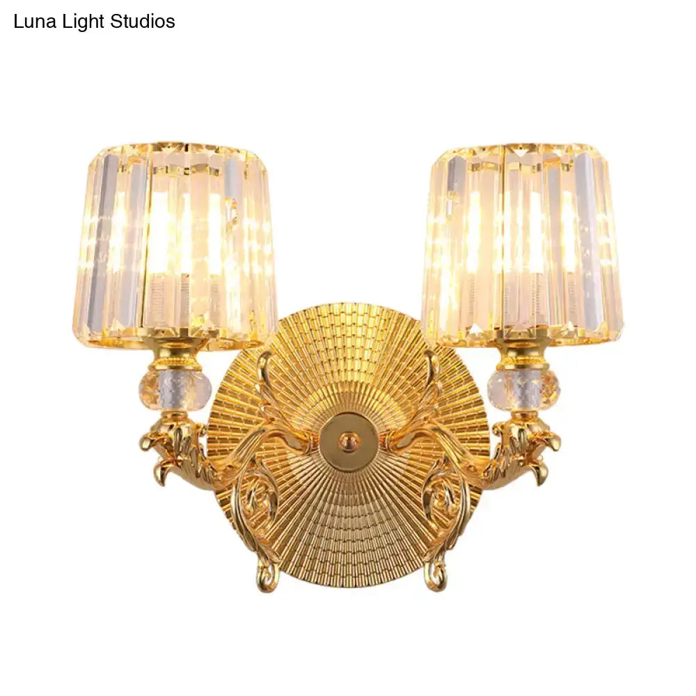 Gold two-light wall sconce with crystal shades by Decorbites on Tampa Home & Garden Store