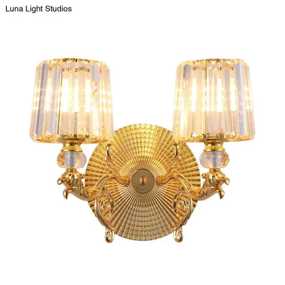 Gold two-light wall sconce with crystal shades by Decorbites on Tampa Home & Garden Store