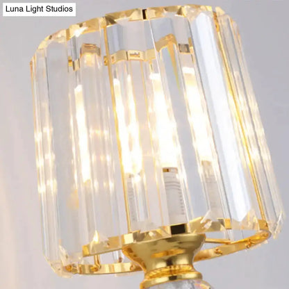 Modern gold tapered crystal wall sconce with clear crystal panels Decorbites on Tampa Home & Garden Store