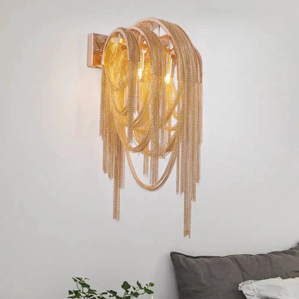 Modern gold tassel wall sconce by Decorbites; looping chain fringe, 110v-120v light fixture on Tampa Home & Garden Store