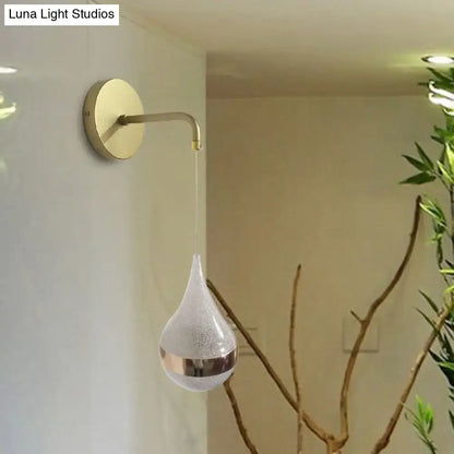 Gold Teardrop Wall Sconce with curved gold arm and frosted glass teardrop pendant on Tampa Home & Garden Store