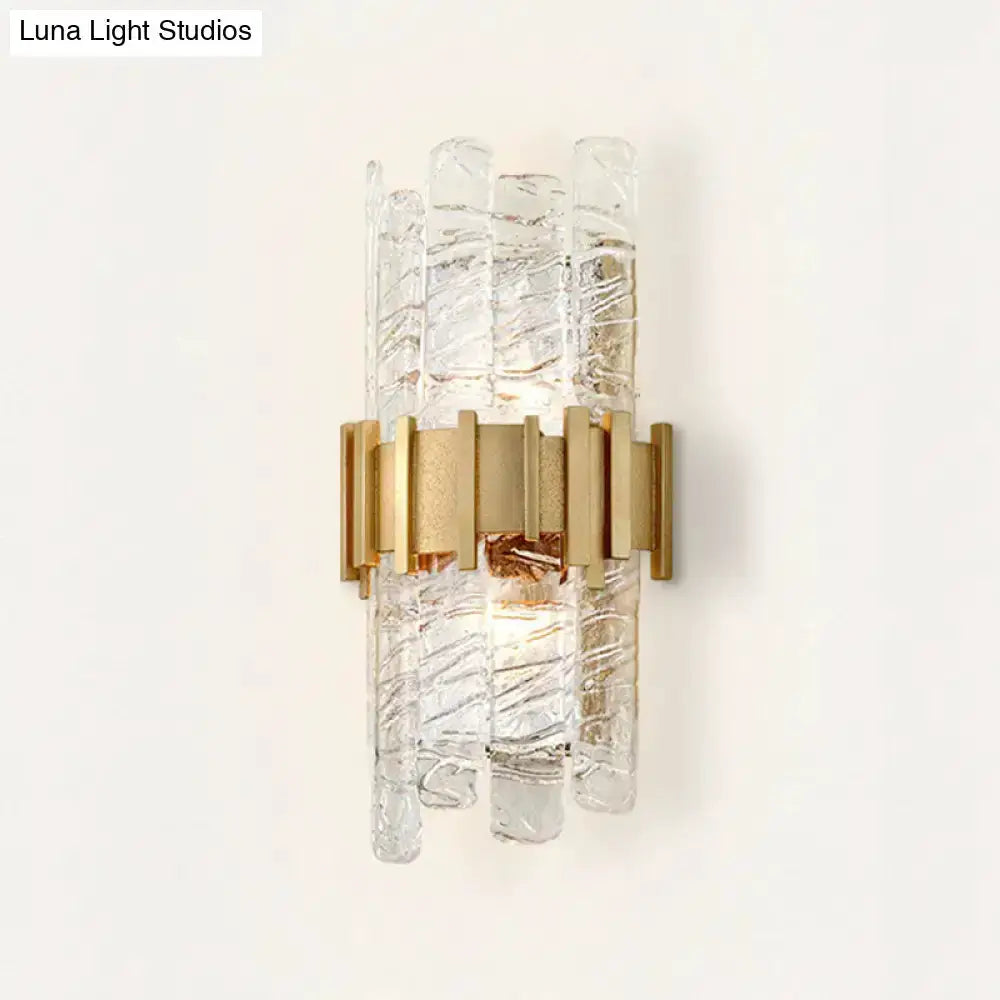 Decorbites modern gold textured glass wall sconce with vertical glass rods on Tampa Home & Garden Store