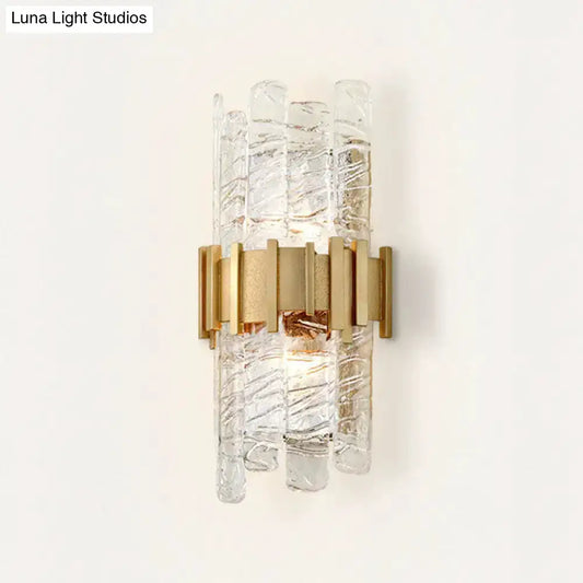 Decorbites modern gold textured glass wall sconce with vertical glass rods on Tampa Home & Garden Store