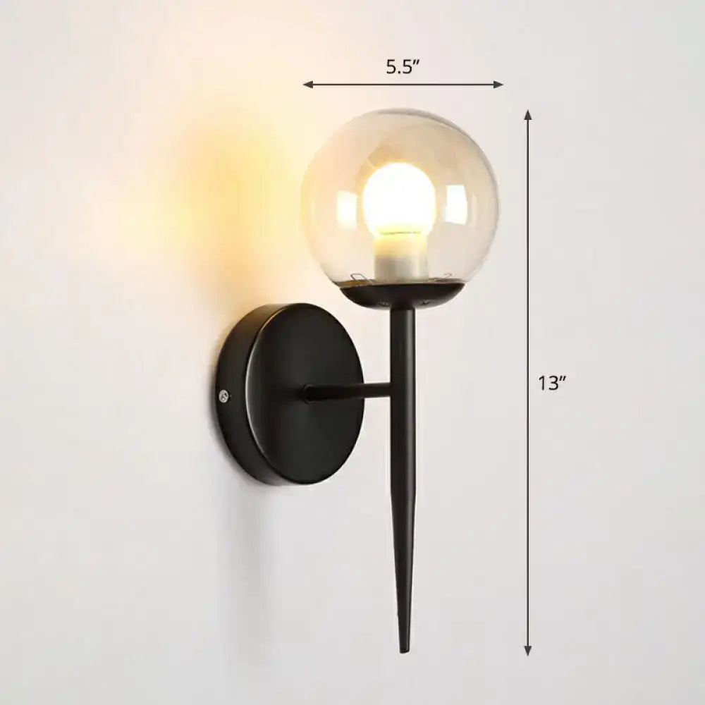 Decorbites Gold Glass Torch Sconce with black metal backplate and clear glass globe on Tampa Home & Garden Store