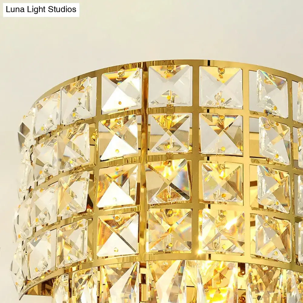 Gold crystal wall lamp with square crystal panels in a curved gold frame by Decorbites on Tampa Home & Garden Store