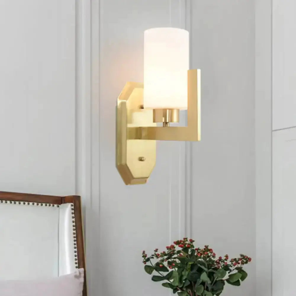 Modern gold tubular wall lamp with glass shade by Decorbites for living room on Tampa Home & Garden Store