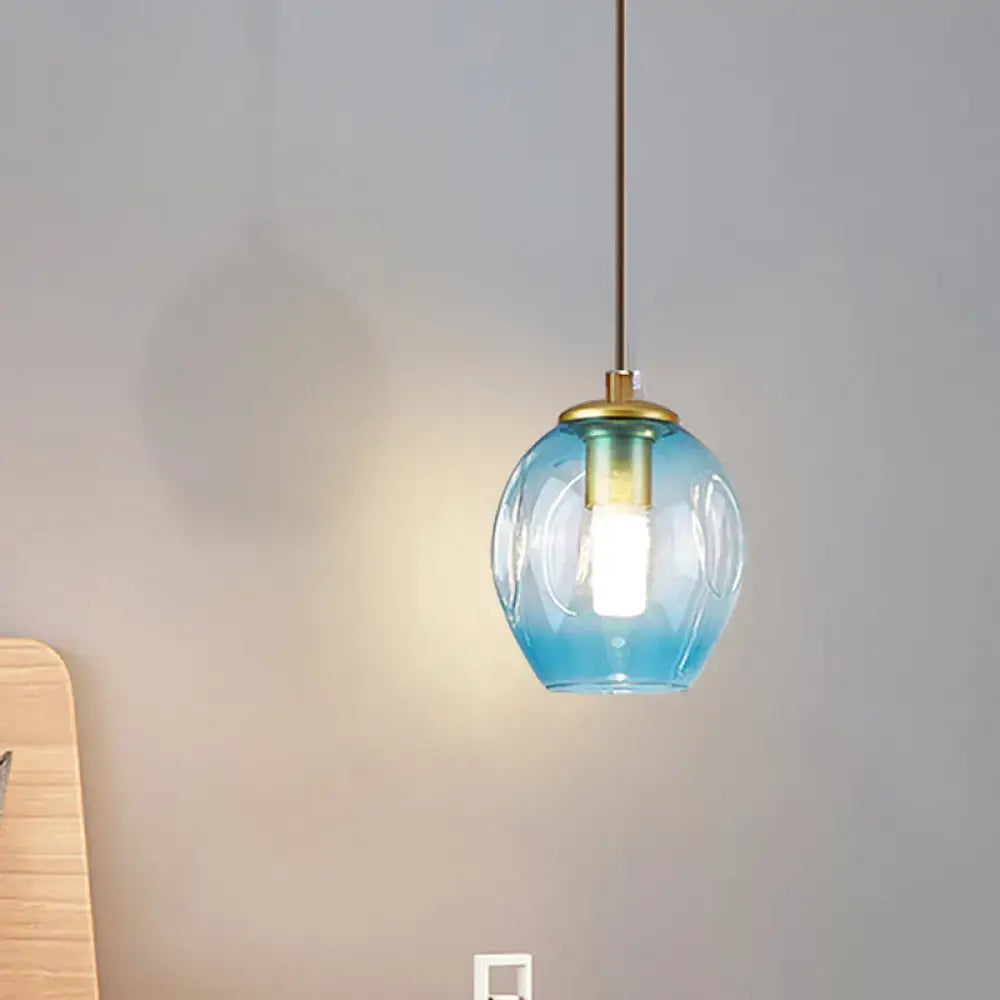 Gold tulip wall lamp pendant with blue glass shade and brass top on Tampa Home & Garden Store