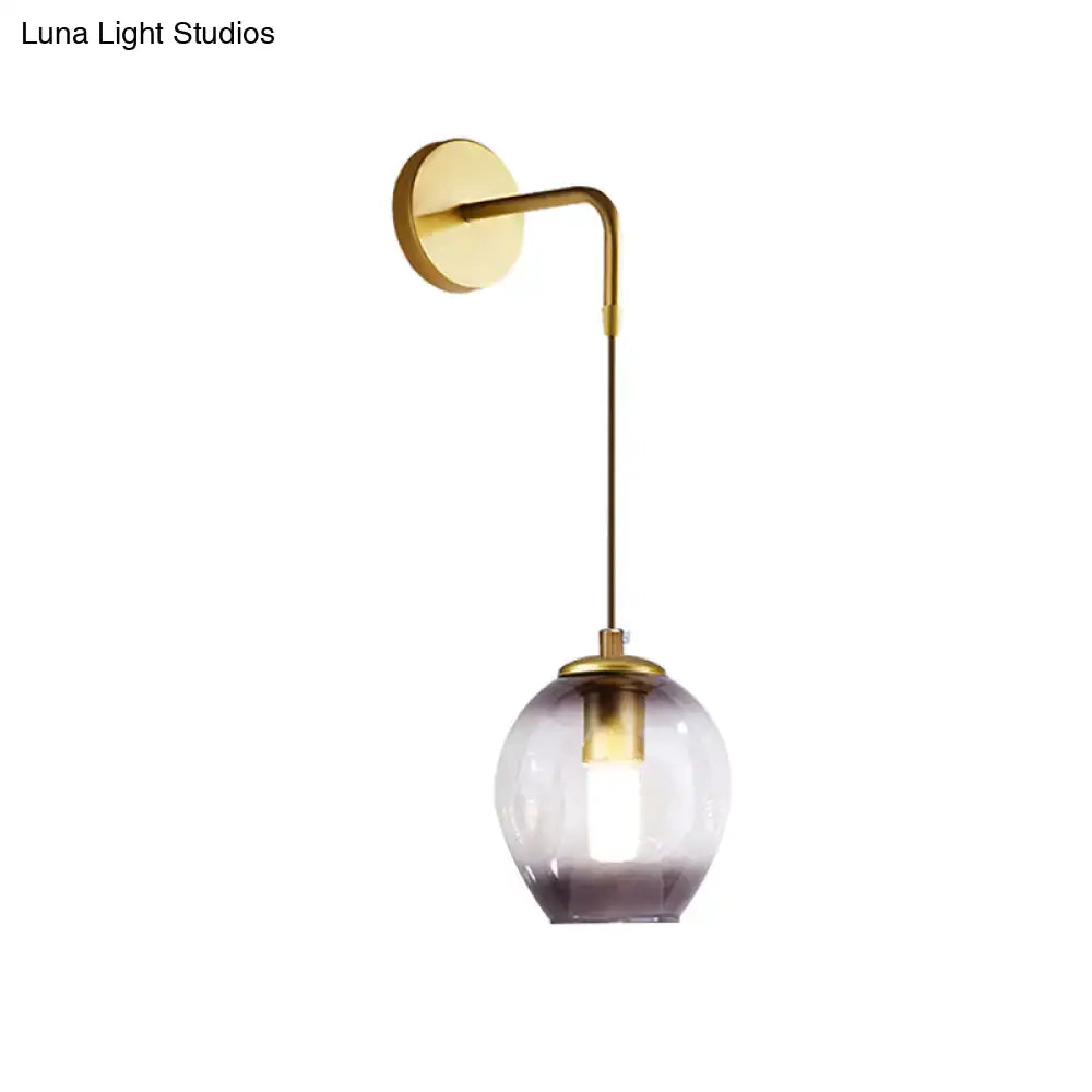 Gold Tulip Wall Lamp with brass arm and purple-tinted glass shade by Decorbites on Tampa Home & Garden Store
