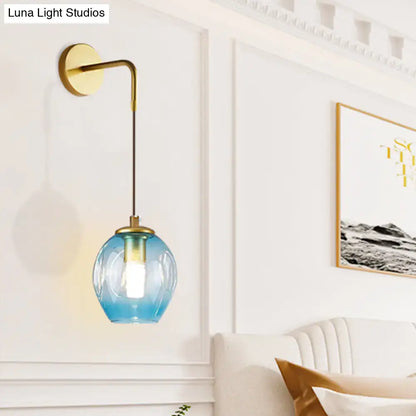 Gold Tulip Wall Lamp by Decorbites with blue glass tulip shade and brass wall mount on Tampa Home & Garden Store