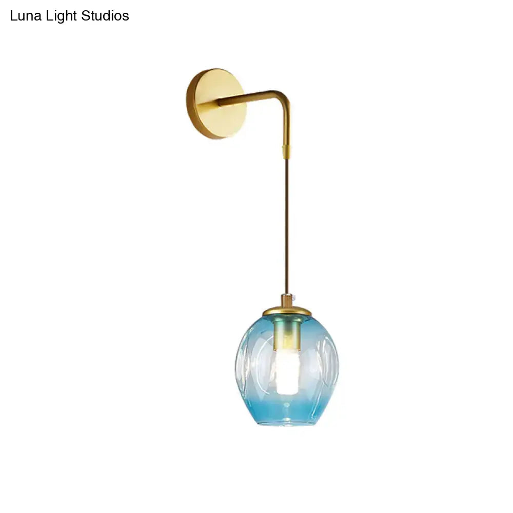 Gold Tulip Wall Lamp by Decorbites with blue glass shade and brass wall mount on Tampa Home & Garden Store