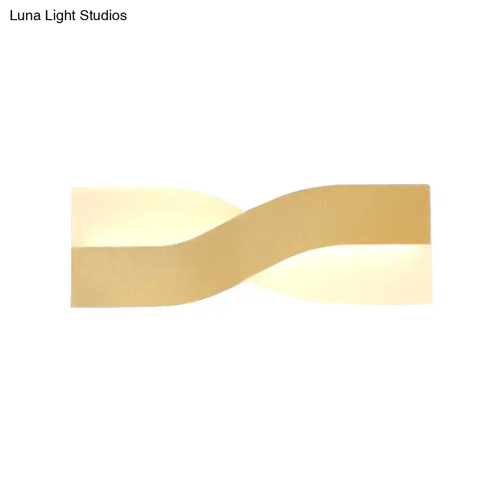 Gold twisted LED wall lamp in acrylic design by Decorbites on Tampa Home & Garden Store