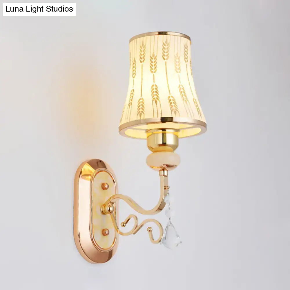 Gold Wheat Glass Arc Sconce with crystal drop, wall-mounted on Tampa Home & Garden Store