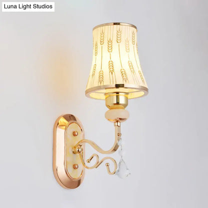 Gold Wheat Glass Arc Sconce with crystal drop, wall-mounted on Tampa Home & Garden Store