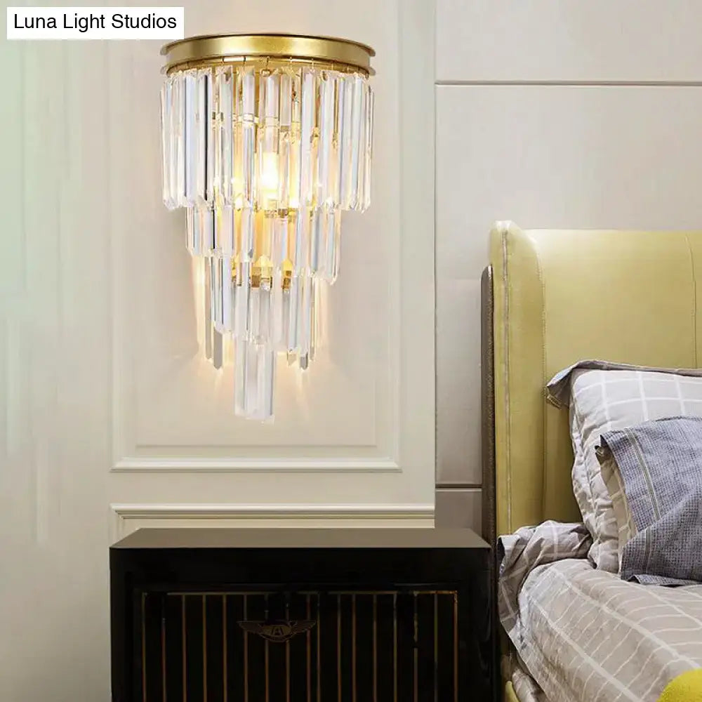 Decorbites gold crystal block sconce with hanging prisms, brass top, wall-mounted by bed on Tampa Home & Garden Store