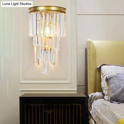 Decorbites gold crystal block sconce with hanging prisms, brass top, wall-mounted by bed on Tampa Home & Garden Store