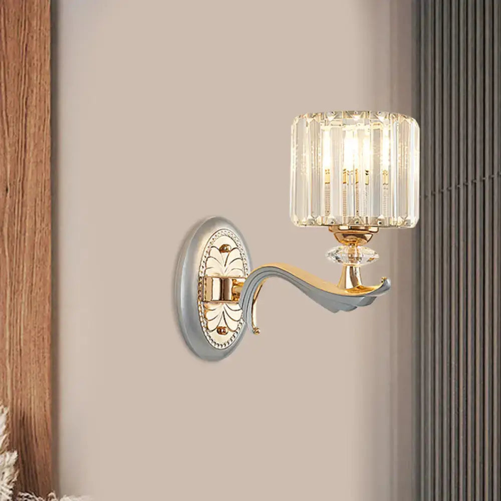 Gold crystal cylinder sconce by Decorbites; ornate wall lamp with ribbed glass shade on Tampa Home & Garden Store