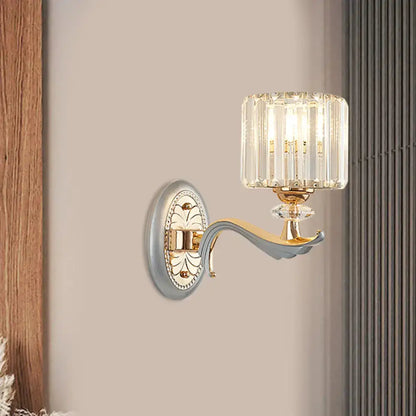 Gold crystal cylinder sconce by Decorbites; ornate wall lamp with ribbed glass shade on Tampa Home & Garden Store
