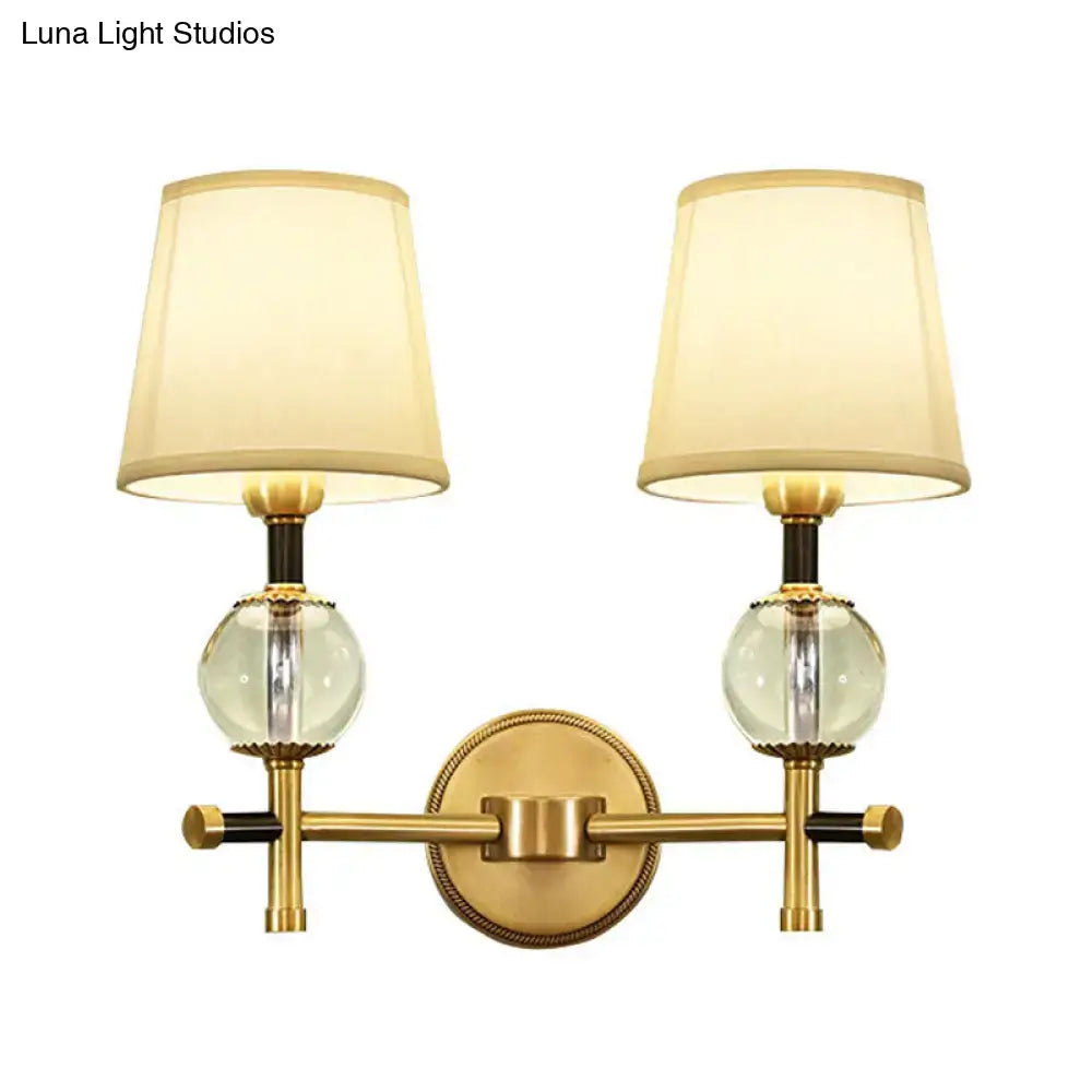 Decorbites Gold Crystal Fabric Shade 2-Light Sconce with glass globes and brass finish on Tampa Home & Garden Store